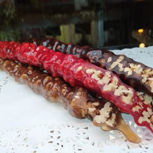 Чурчхела с цельный грецким орехом(гранатовый,белый и темный виноград).jpeg